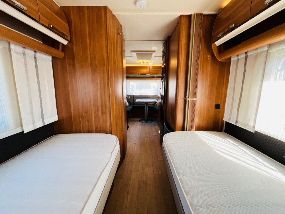 Beispiel für Einzelbetten und Sitzgrippe.